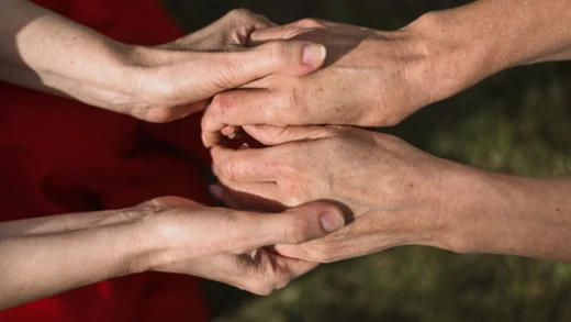 Hands stacked together
