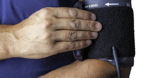 Blood pressure cuff on arm