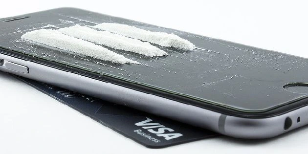 Cocaine on phone and card